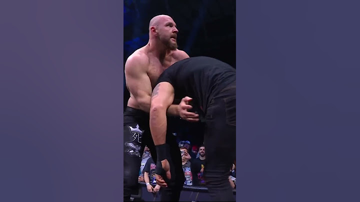 AEW World Champ Jon Moxley with the Paradigm Shift on the announce desk during AEW Dynamite!