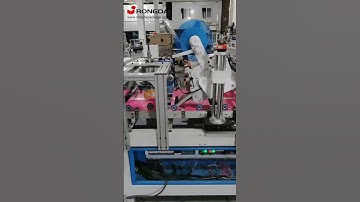 Automatic lever arch file making machine