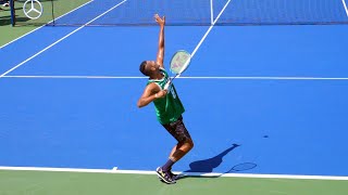 ... nick kyrgios serve technique is very unique. he has a fast
continuous motion and