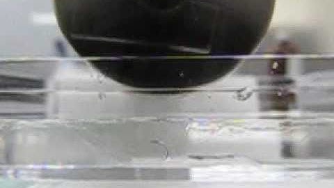 Asymmetric movement of artificial cilium