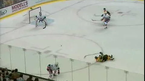 Brad Marchand catapults over Jack Hillen