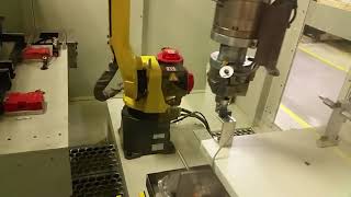 Robot deburring cell