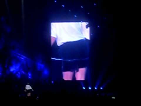 Angus Young of AC/DC doing his signature strip and mooning. Sorry for the spotty sound, the mic on my camera couldn't handle the extreme loudness of an AC/DC concert