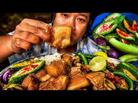 Eating spicy huge pork with bitter gourd and egg plant