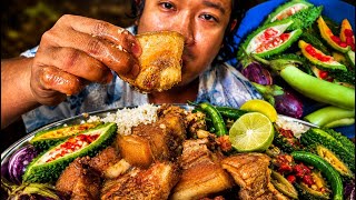 Eating spicy huge pork with bitter gourd and egg plant