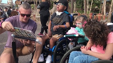 Dad modeling PODD at Disney