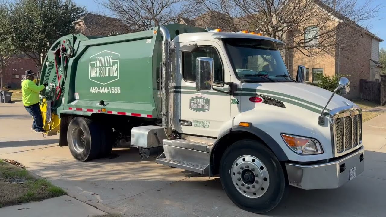 Garbage Truck Compacting Loads of Trash: Frontier Waste Solutions Peterbilt 548 McNeilus M5