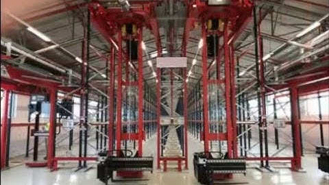 Overhead Stacker Crane With Trilateral Fork Stores Goods On Multiple Rows Of VNA Very Narrow Aisles