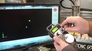 CNC router AXIOM machining a photo engraving