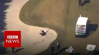 Japan’s PM falls into a golf bunker - BBC News