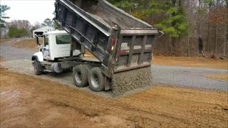 Reverse Drop Spreading Gravel from Dump Truck! This guy is good!!