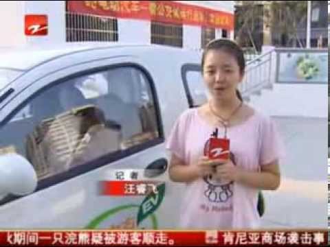 kandi-technologies-hangzhou-china-1st-carshare-tower,-zhejiang-tv-news-clip..