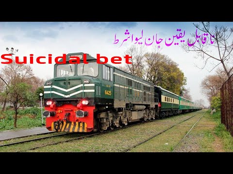 Man Lying on Train Track in Pakistan