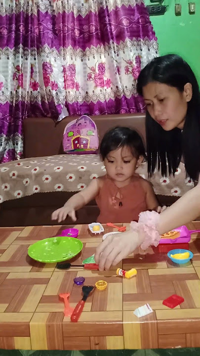 Pretend cooking with Iya Bebe