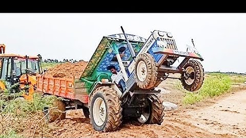 JCB 3DX SWARAJ 744 XT loading working jcb 3dx video