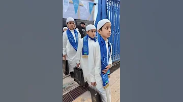 ضمن حفل ضخم أقيم في مدينة إدلب دخول الطلاب والطالبات من حفظة القرآن الكريم إلى الملعب البلدي 