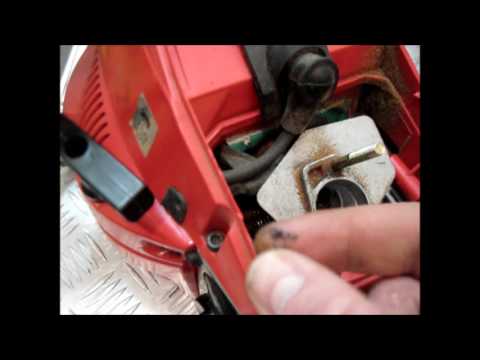 Chainsaw stalls when pressing on gas. How to adjust the carburetor