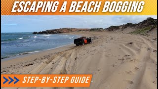 Bogged on a beach - escape before the tide comes in!