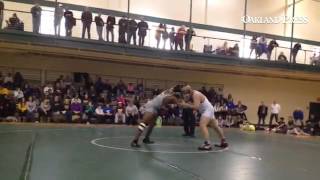 Kettering s Matt Okaiye battles Catholic zcentral s Jimmy Russell at Novi distri