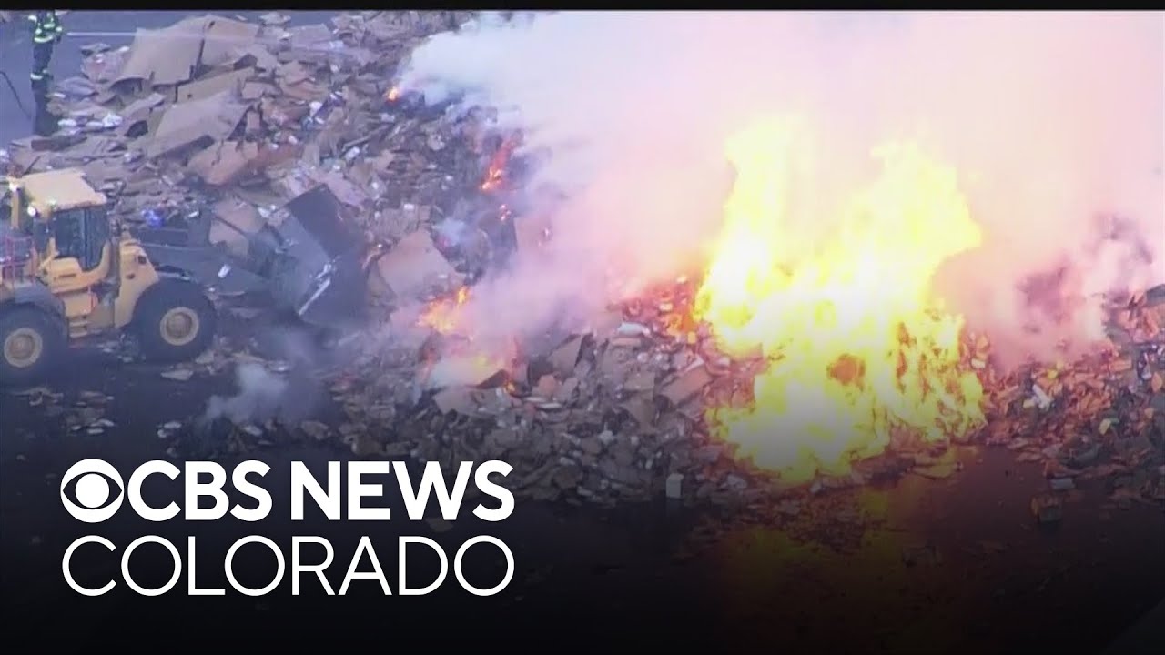 Fire crews battle fire burning near I-70 and Colorado Boulevard - YouTube