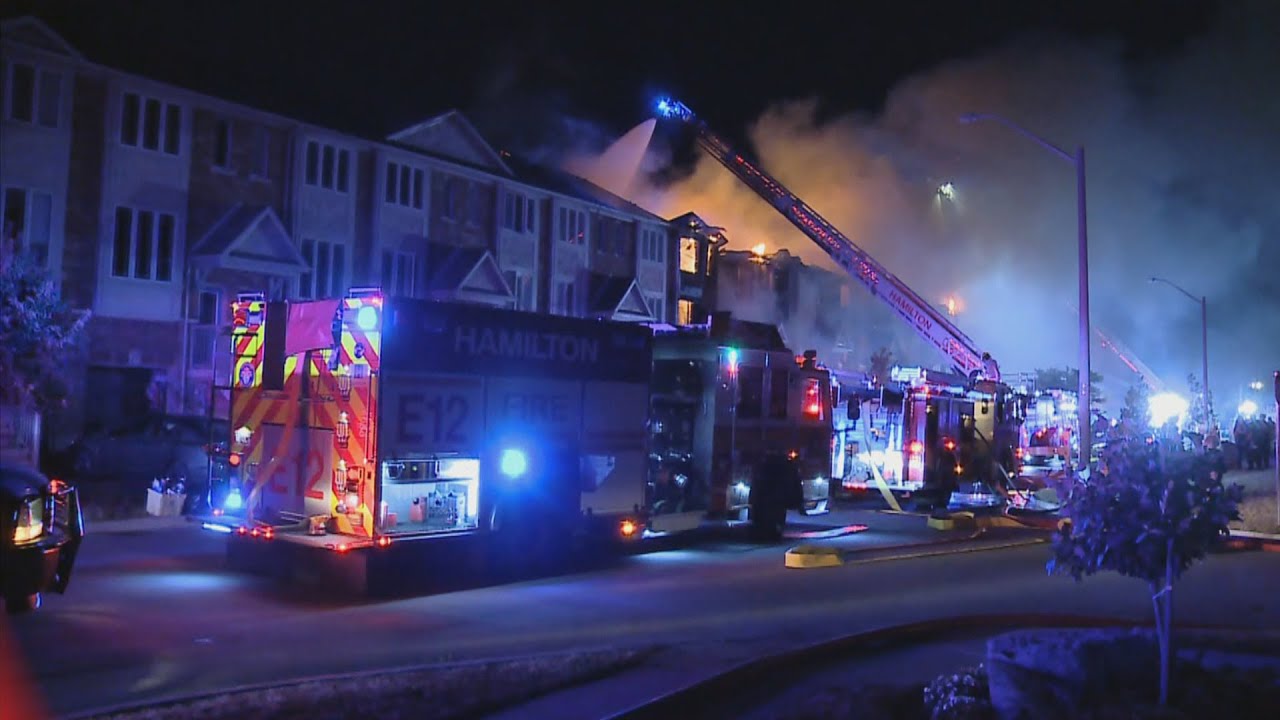 Massive fire rips through Hamilton townhomes - YouTube