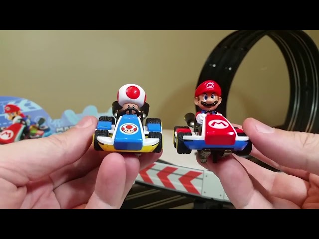 Carrera GO!!! 62492 Mario Kart Mach 8 Electric Slot Car Racing Track Set  1:43 Scale feat. Mario and Luigi