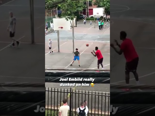 The time when Joel Embiid played pickup and windmill dunked on a random guy at the park 😂 class=
