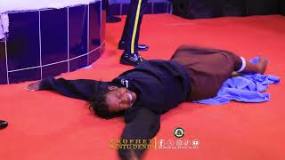 An instant miracle occurred after Prophet Kintu Denis prayed for a woman who couldn't walk