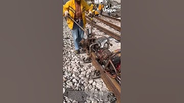 Railroad maintenance: tightening bolts with a track machine