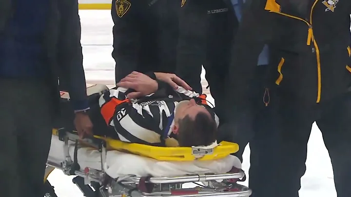 referee Steve Kozari collided with Haydn Fleury and had to be stretchered off the ice
