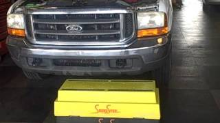 http://www.shure-step.com This video shows how a mechanic working on a 3/4 ton truck using a sturdy step stool can get his work 