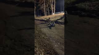 Guy rides go kart up ramp then flips forward and lands on his chest