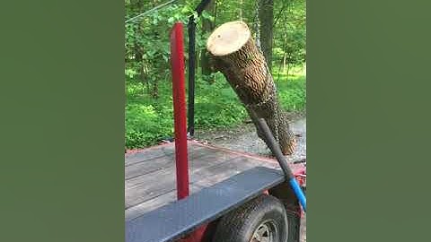Loading Ash Log Onto Custom Built Log Trailer With Log Arch