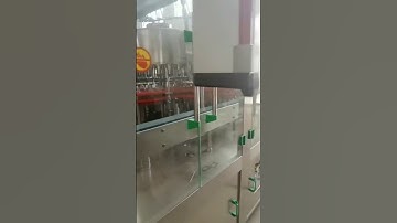 How is it Packed - Lemon Juice filling and capping Machine