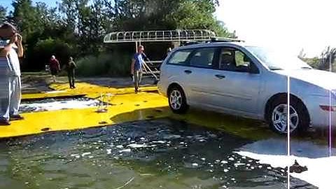 AMAZING!!! Vehicle Drives on Water with Paradox Access Solutions and All Terrain Road™ (ATR) Mats!!!