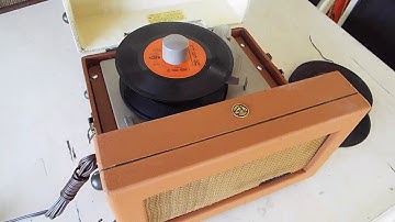 RCA 6-EY-3A 45 RPM automatic record player playing a stack of 45