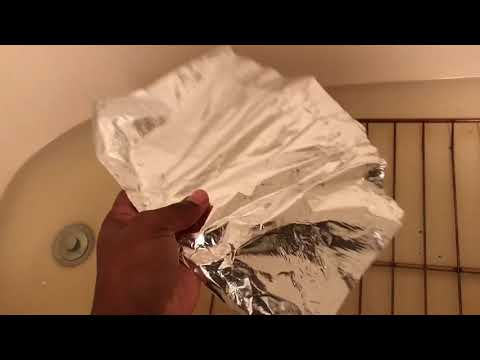 clean-oven-racks-with-dryer-sheets-in-tub