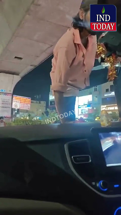 Youth Under Ganja Influence Stops A Car And Climbs On It At Moosapet