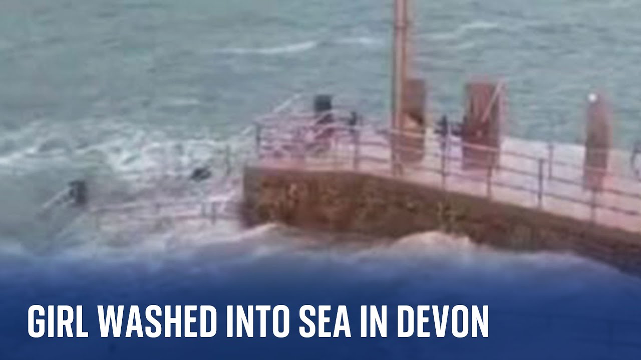 ⁣Devon: Footage shows moment girl is swept into the sea by huge wave