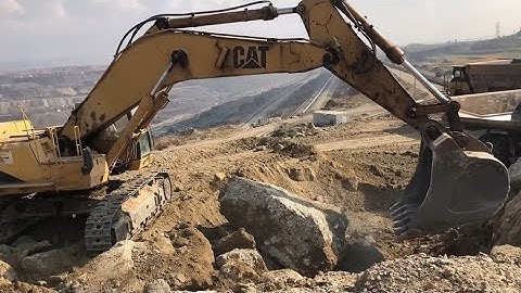 Massive Open-Pit Mining Operation: Cat 375 Excavator Loading Blasted Rock - Sotiriadis/Labrianidis