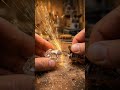 A small, hand-held woodworking machine cuts into a large diamond. #woodworkingtools