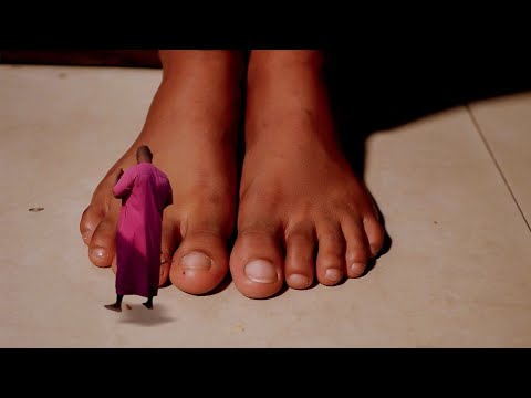 Giantess Gives Tiny Man A Foot Job 