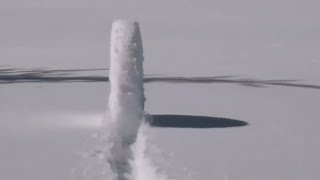 Snowball Rolling Downhill Forms a Giant Wheel