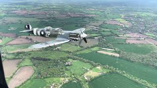 Spitfire dive away over Hampshire. Chase plane footage.