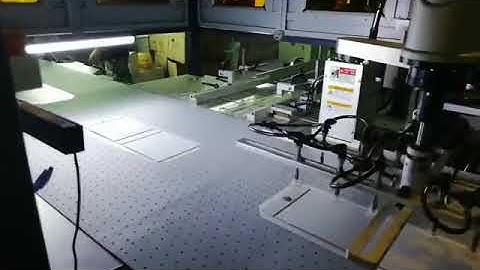 Book cover positioning machine