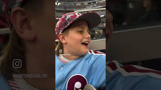 Phillies fan mixing it up with Roger Clemens as he watches his son play against Braves in Atlanta