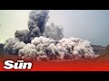 Dramatic footage shows moment Philippines' Taal volcano spews huge amount of ash into sky