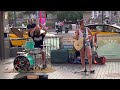 Street performer in barcelona sings whats up aryn