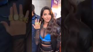 Nora Fatehi in Sexy Black dress in Red Carpet