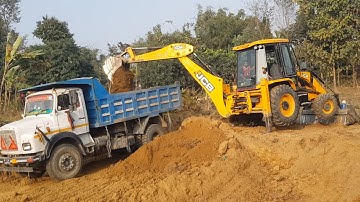 JCB Backhoe Machine Cutting Soil and Loading in Dump Truck - JCB Cleaning Agro Field